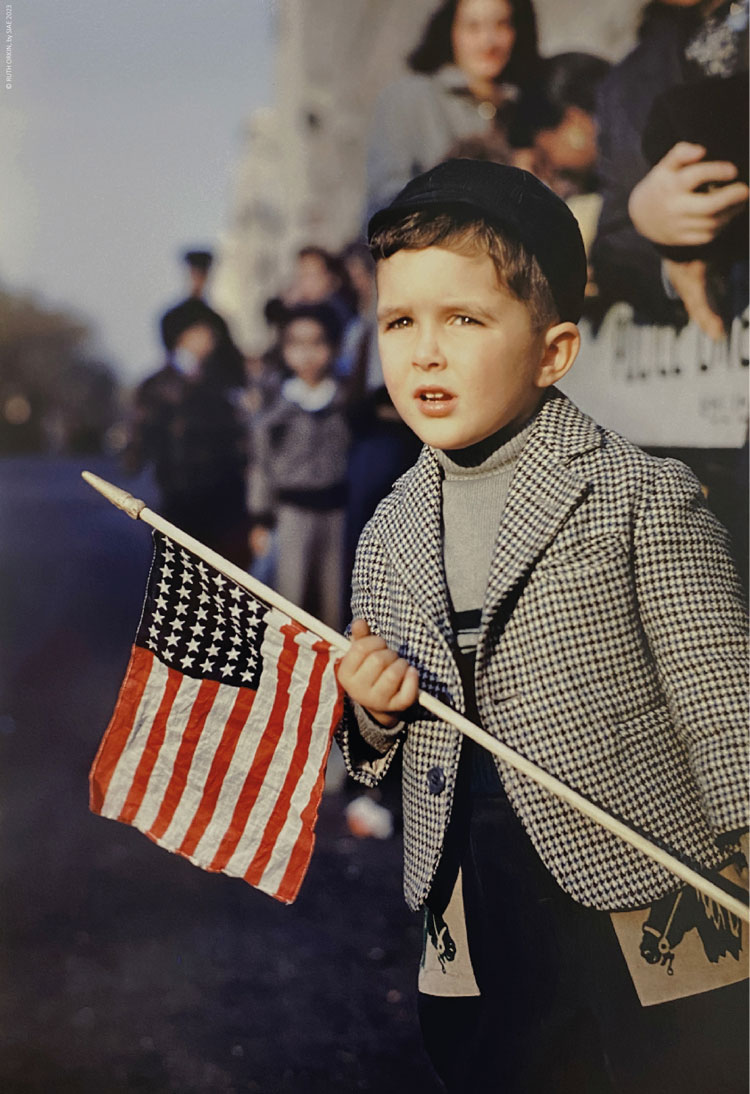 Ruth Orkin, Boy with flag, 1949. © Ruth Orkin by SIAE 2023