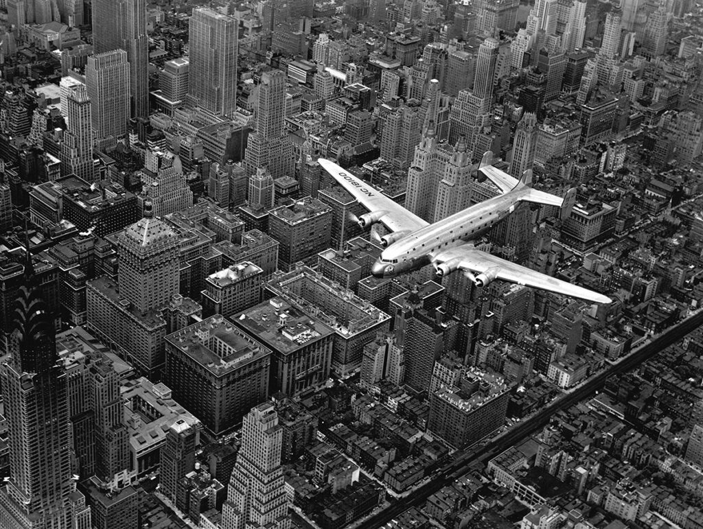 Douglas Four Over Manhattan New York, USA, 1939. Margaret Bourke-White/The LIFE Picture Collection/Shutterstock